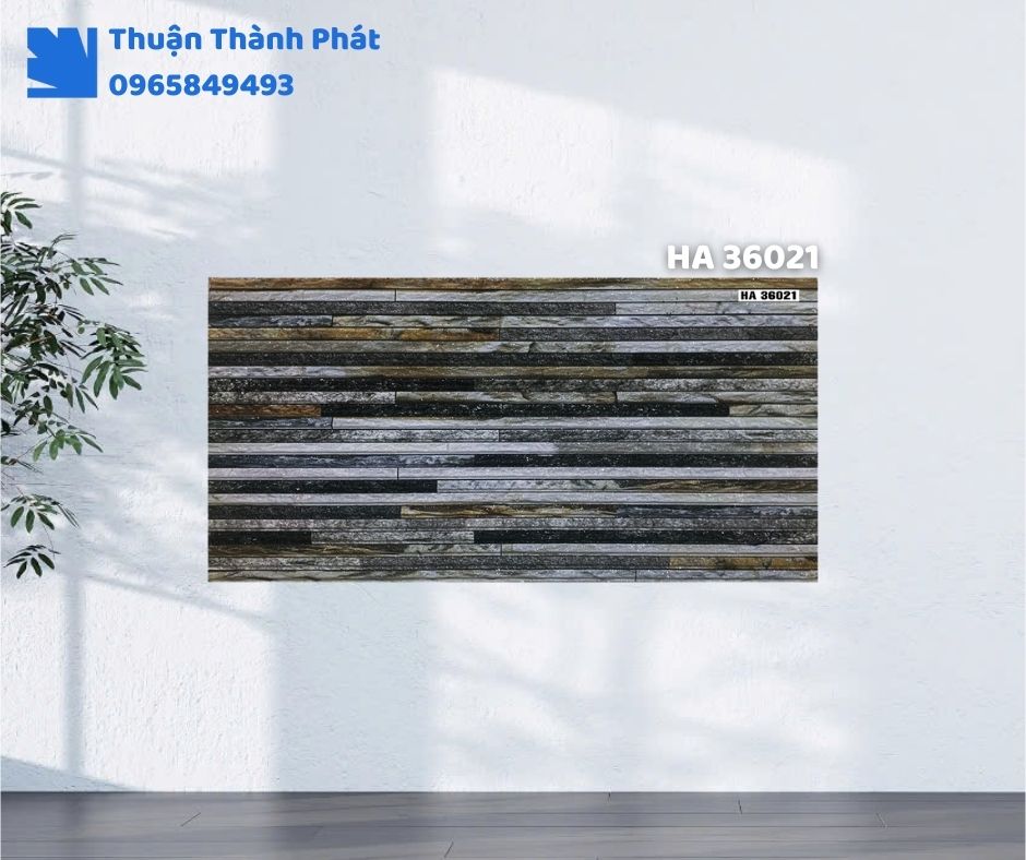 Gạch ốp tường HA 36021 Thanh Thanh ốp phòng khách, họa tiết vân đá sang trọng, tông xám trung tinh tế.