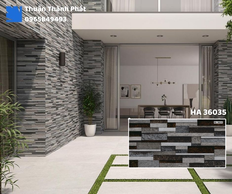 Gạch ốp tường HA 36035 Thanh Thanh ốp phòng khách, họa tiết vân đá sang trọng, tông xám nhạt tinh tế.