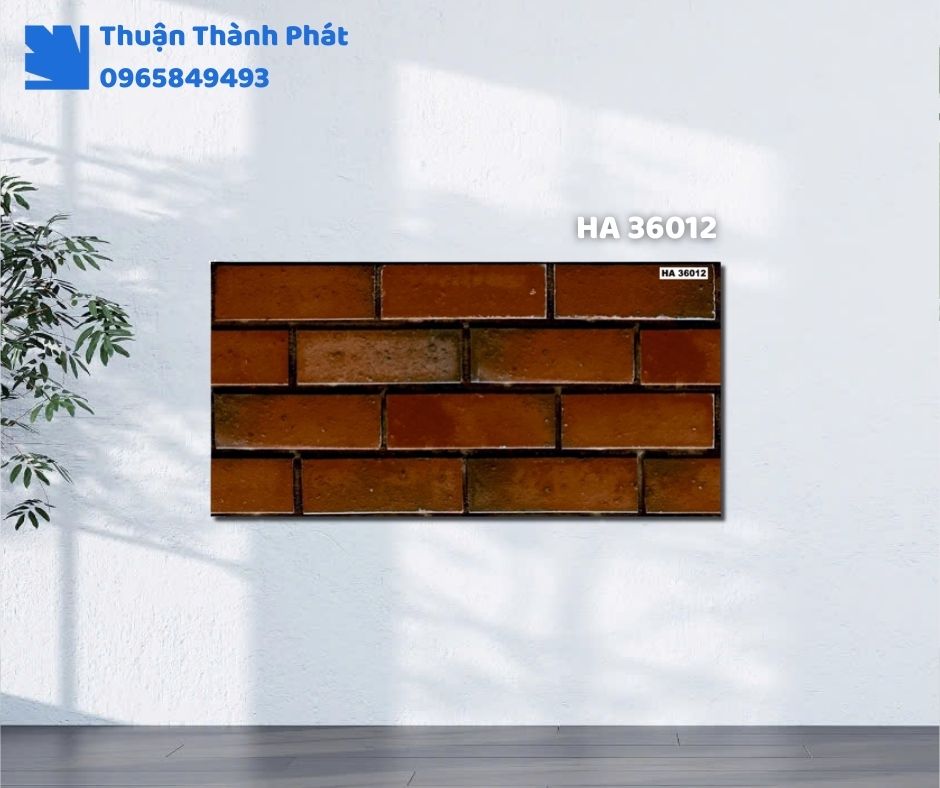 Gạch ốp tường HA 36012 Hà Thanh ốp phòng khách, họa tiết vân đá sang trọng, tông xám đậm tinh tế.