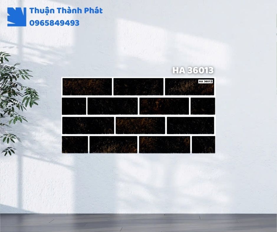 Gạch ốp tường HA 36013 Hà Thanh ốp phòng khách, họa tiết vân đá sang trọng, tông xám nhạt tinh tế.