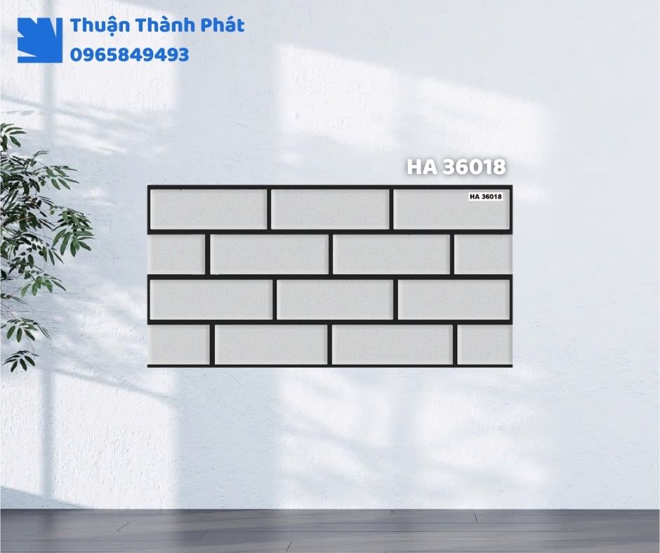 Gạch ốp tường HA 36018 Thanh Thanh ốp phòng khách, họa tiết vân đá sang trọng, tông xám nhạt tinh tế.